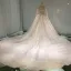 Luxury / Gorgeous Champagne See-through Wedding Dresses 2019 Princess Scoop Neck Long Sleeve Backless Appliques Lace Pearl Beading Glitter Tulle Cathedral Train Ruffle