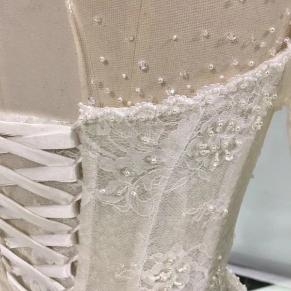 Luxury / Gorgeous Champagne See-through Wedding Dresses 2019 Princess Scoop Neck Long Sleeve Backless Appliques Lace Pearl Beading Glitter Tulle Cathedral Train Ruffle