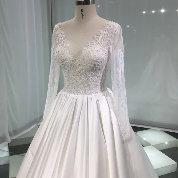 Illusion Ivory Satin Wedding Dresses 2019 A-Line / Princess Deep V-Neck Long Sleeve Backless Pearl Beading Chapel Train Ruffle