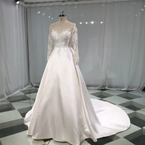 Élégant Ivoire Satin Transparentes Robe De Mariée 2019 Princesse Encolure Dégagée Percé Manches Longues Dos Nu Noeud Appliques En Dentelle Perlage Chapel Train Volants