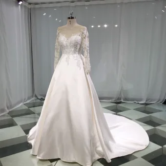 Elegante Ivoor Satijn Doorzichtige Trouwjurken 2019 A Lijn Ronde Hals Doorboord Lange Mouwen Ruglooze Strik Appliques Kant Kralen Chapel Train Ruche