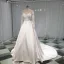 Élégant Ivoire Satin Transparentes Robe De Mariée 2019 Princesse Encolure Dégagée Percé Manches Longues Dos Nu Noeud Appliques En Dentelle Perlage Chapel Train Volants