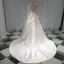 Élégant Ivoire Satin Transparentes Robe De Mariée 2019 Princesse Encolure Dégagée Percé Manches Longues Dos Nu Noeud Appliques En Dentelle Perlage Chapel Train Volants