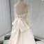 Élégant Ivoire Satin Transparentes Robe De Mariée 2019 Princesse Encolure Dégagée Percé Manches Longues Dos Nu Noeud Appliques En Dentelle Perlage Chapel Train Volants