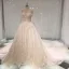 Meilleur Champagne Transparentes Robe De Mariée 2019 Princesse Encolure Dégagée Percé Manches Longues Dos Nu Appliques En Dentelle Perle Cathedral Train Volants