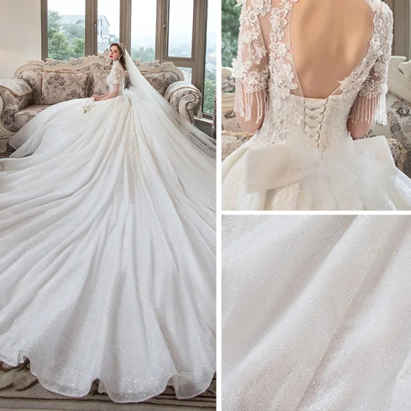 Luxe Ivoire Transparentes Robe De Mariée 2019 Robe Boule Col Haut Manches Courtes Dos Nu Perlage Gland Appliques En Dentelle Glitter Tulle Cathedral Train Volants