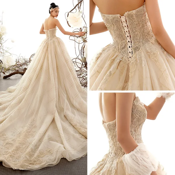 Luksus Champagne Brudekjoler 2019 Ballkjole Kjæreste Uten Ermer Ryggløse Appliques Blonder Beading Glitter Tyll Chapel Train Buste