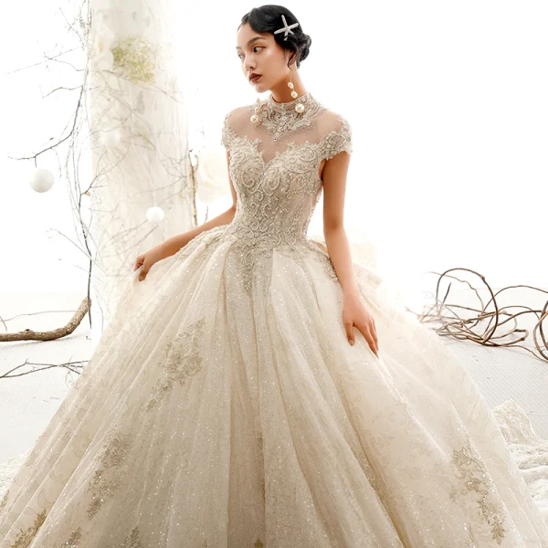 Luxury / Gorgeous Vintage / Retro Champagne See-through Wedding Dresses 2019 Ball Gown High Neck Short Sleeve Appliques Lace Glitter Tulle Cathedral Train Ruffle