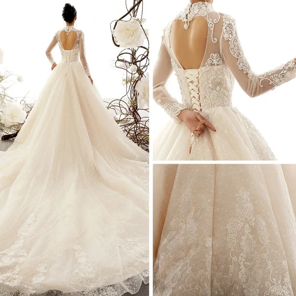 Vintage / Originale Champagne Transparentes Robe De Mariée 2019 Princesse Col Haut Manches Longues Forme de coeur Dos Nu Appliques En Dentelle Perlage Cathedral Train Volants