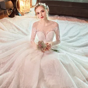 Élégant Ivoire Transparentes Robe De Mariée 2019 Princesse Encolure Dégagée Manches Longues Dos Nu Perlage Glitter Tulle Chapel Train Volants