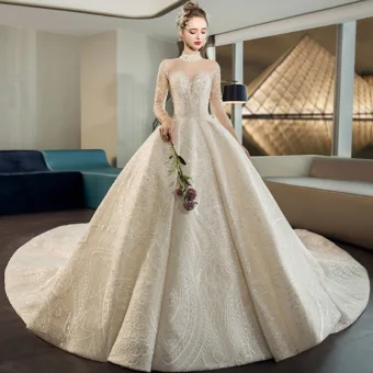 Luxury Gorgeous Champagne See Through Wedding Dresses 2019 Ball Gown High Neck 3 4 Sleeve Backless Sequins Beading Cathedral Train Ruffle