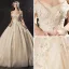 Vintage / Originale Champagne Robe De Mariée 2019 Princesse De l'épaule Manches Courtes Dos Nu Appliques En Dentelle Glitter Tulle Chapel Train Volants