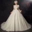 Abordable Ivoire Transparentes Robe De Mariée 2019 Robe Boule Encolure Carrée Manches Courtes Dos Nu Appliques En Dentelle Chapel Train Volants