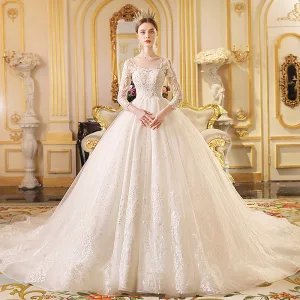 Best Ivory See Through Wedding Dresses 2019 Ball Gown Scoop Neck 3 4 Sleeve Backless Appliques Lace Glitter Cathedral Train Ruffle