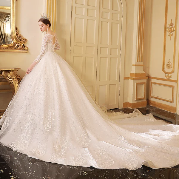 Best Ivory See-through Wedding Dresses 2019 Ball Gown Scoop Neck 3/4 Sleeve Backless Appliques Lace Glitter Cathedral Train Ruffle