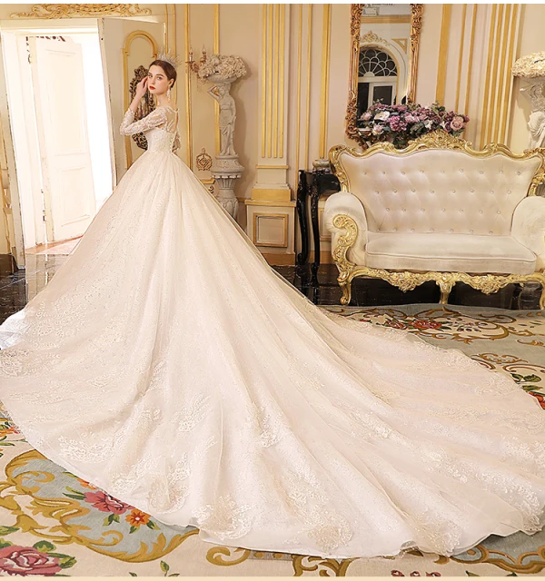 Best Ivory See-through Wedding Dresses 2019 Ball Gown Scoop Neck 3/4 Sleeve Backless Appliques Lace Glitter Cathedral Train Ruffle