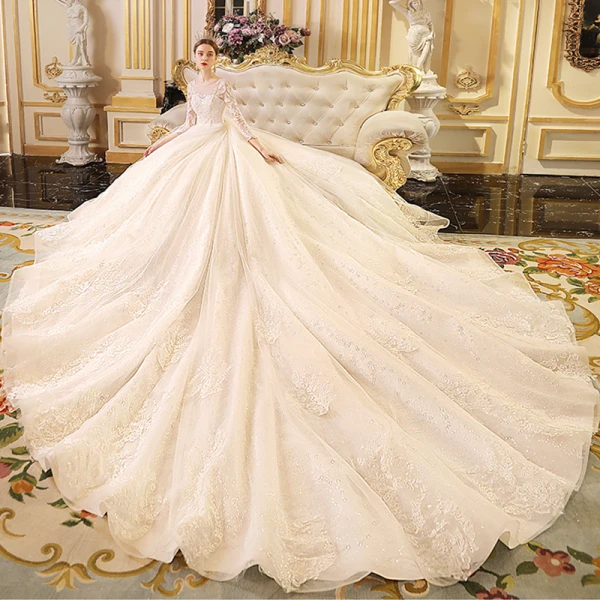 Best Ivory See-through Wedding Dresses 2019 Ball Gown Scoop Neck 3/4 Sleeve Backless Appliques Lace Glitter Cathedral Train Ruffle