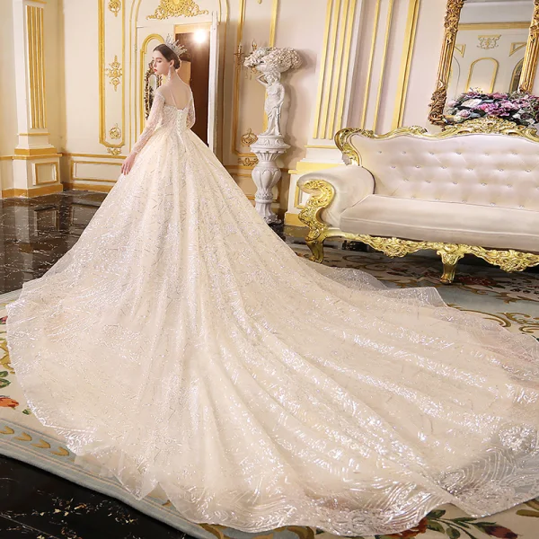 Sparkly Champagne See-through Wedding Dresses 2019 Ball Gown Scoop Neck Long Sleeve Backless Glitter Sequins Cathedral Train Ruffle