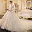 Sparkly Champagne See-through Wedding Dresses 2019 Ball Gown Scoop Neck Long Sleeve Backless Glitter Sequins Cathedral Train Ruffle