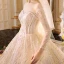 Sparkly Champagne See-through Wedding Dresses 2019 Ball Gown Scoop Neck Long Sleeve Backless Glitter Sequins Cathedral Train Ruffle