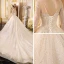 Sparkly Champagne See-through Wedding Dresses 2019 Ball Gown Scoop Neck Long Sleeve Backless Glitter Sequins Cathedral Train Ruffle