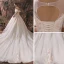 Romantisch Champagner Durchsichtige Brautkleider / Hochzeitskleider 2019 A Linie Rundhalsausschnitt Kurze Ärmel Rückenfreies Applikationen Spitze Glanz Tülle Kathedrale Schleppe Rüschen