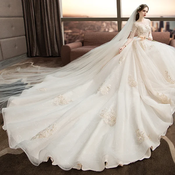 Illusion Ivoire Transparentes Robe De Mariée 2019 Princesse Encolure Carrée Manches Longues Dos Nu Appliques En Dentelle Perlage Glitter Tulle Cathedral Train Volants
