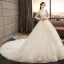 Illusion Ivoire Transparentes Robe De Mariée 2019 Princesse Encolure Carrée Manches Longues Dos Nu Appliques En Dentelle Perlage Glitter Tulle Cathedral Train Volants