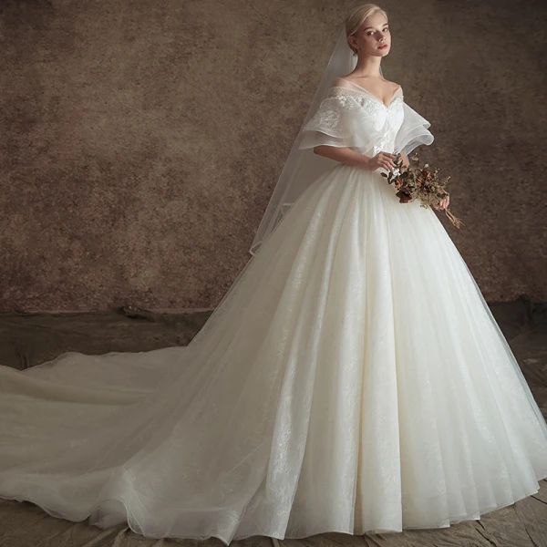 Elegante Ivory / Creme Durchsichtige Brautkleider / Hochzeitskleider 2019 A Linie V-Ausschnitt Glockenhülsen Rückenfreies Applikationen Spitze Perlenstickerei Kapelle-Schleppe Rüschen