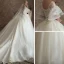Elegante Ivory / Creme Durchsichtige Brautkleider / Hochzeitskleider 2019 A Linie V-Ausschnitt Glockenhülsen Rückenfreies Applikationen Spitze Perlenstickerei Kapelle-Schleppe Rüschen
