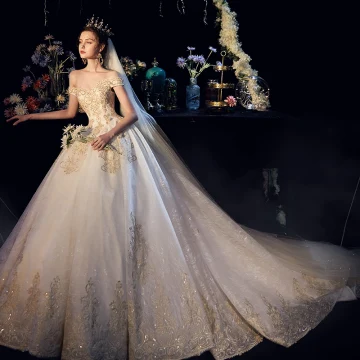 Luxury Gorgeous Champagne Wedding Dresses 2019 A Line Princess Off The Shoulder Short Sleeve Backless Appliques Lace Beading Glitter Tulle Cathedral Train