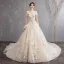 Abordable Champagne Robe De Mariée 2019 Princesse De l'épaule Manches Courtes Dos Nu En Dentelle Appliques Chapel Train Volants