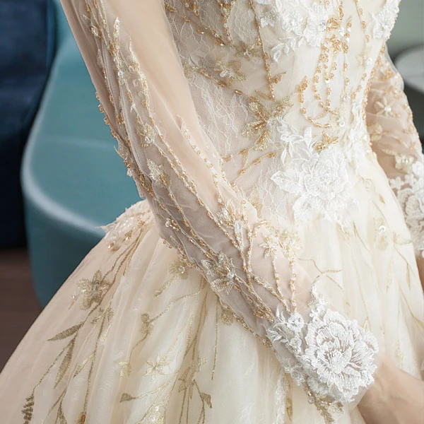 Élégant Champagne Transparentes Robe De Mariée 2019 Princesse Encolure Dégagée Manches Longues Dos Nu Cristal Perlage Appliques En Dentelle Cathedral Train Volants