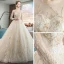 Élégant Champagne Transparentes Robe De Mariée 2019 Princesse Encolure Dégagée Manches Longues Dos Nu Cristal Perlage Appliques En Dentelle Cathedral Train Volants
