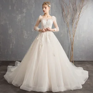 Élégant Champagne Transparentes Robe De Mariée 2019 Princesse Encolure Carrée Manches Longues Dos Nu Appliques En Dentelle Perlage Perle Paillettes Chapel Train Volants