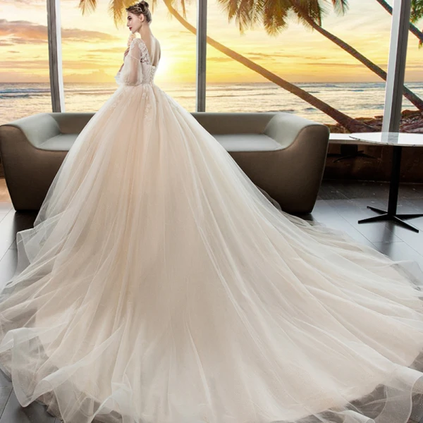 Romantique Champagne Transparentes Robe De Mariée 2019 Princesse Encolure Dégagée Gonflée 3/4 Manches Dos Nu Appliques En Dentelle Perlage Cristal Glitter Tulle Chapel Train Volants