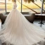 Romantique Champagne Transparentes Robe De Mariée 2019 Princesse Encolure Dégagée Gonflée 3/4 Manches Dos Nu Appliques En Dentelle Perlage Cristal Glitter Tulle Chapel Train Volants