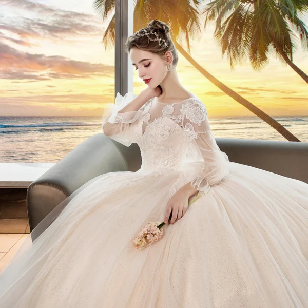 Romantique Champagne Transparentes Robe De Mariée 2019 Princesse Encolure Dégagée Gonflée 3/4 Manches Dos Nu Appliques En Dentelle Perlage Cristal Glitter Tulle Chapel Train Volants