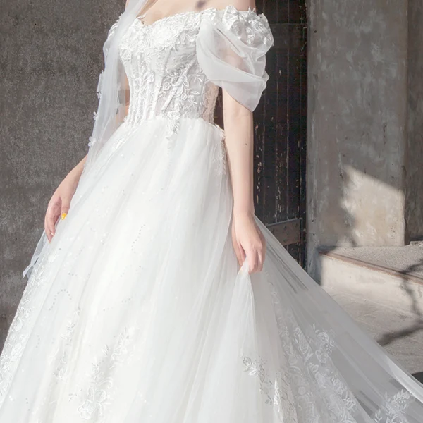 Étourdissant Ivoire Robe De Mariée 2019 Princesse De l'épaule Gonflée Manches Courtes Dos Nu Appliques En Dentelle Tulle Glitter Royal Train Volants