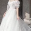 Étourdissant Ivoire Robe De Mariée 2019 Princesse De l'épaule Gonflée Manches Courtes Dos Nu Appliques En Dentelle Tulle Glitter Royal Train Volants