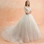 Meilleur Ivoire Transparentes Robe De Mariée 2019 Princesse Encolure Dégagée 3/4 Manches Dos Nu Appliques En Dentelle Perlage Cathedral Train Volants