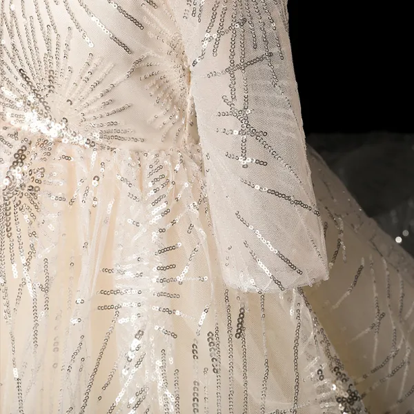 Sparkly Ivory See-through Flower Girl Dresses 2019 Ball Gown Scoop Neck Long Sleeve Glitter Sequins Chapel Train Ruffle Backless Wedding Party Dresses