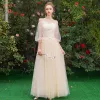 Affordable Elegant Champagne See-through Bridesmaid Dresses 2019 A-Line / Princess Sash Appliques Lace Floor-Length / Long Ruffle Backless Wedding Party Dresses