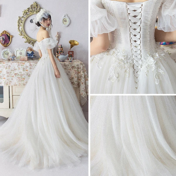 Ivoire Robe De Mariée 2019 Princesse De l'épaule Gonflée Manches Courtes Dos Nu Appliques En Dentelle Cristal Perlage Tribunal Train Volants