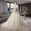 Stunning Champagne Wedding Dresses 2019 Ball Gown Off-The-Shoulder 1/2 Sleeves Backless Appliques Lace Cathedral Train Ruffle