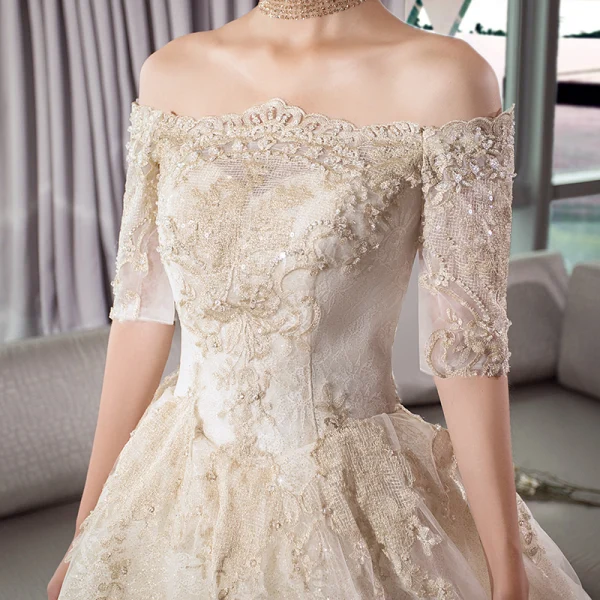 Stunning Champagne Wedding Dresses 2019 Ball Gown Off-The-Shoulder 1/2 Sleeves Backless Appliques Lace Cathedral Train Ruffle