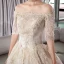 Stunning Champagne Wedding Dresses 2019 Ball Gown Off-The-Shoulder 1/2 Sleeves Backless Appliques Lace Cathedral Train Ruffle