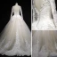 Classic Champagne Winter Wedding Dresses 2018 Ball Gown See-through Scoop Neck Long Sleeve Backless Appliques Lace Cathedral Train Ruffle