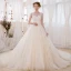 Romantique Champagne Transparentes Robe De Mariée 2018 Robe Boule Encolure Dégagée Sans Manches Dos Nu Appliques En Dentelle Glitter Perlage Cathedral Train Volants