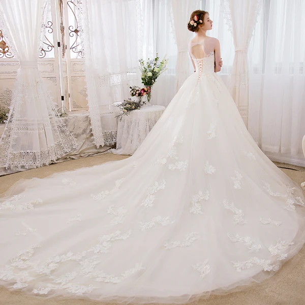 Romantique Champagne Transparentes Robe De Mariée 2018 Robe Boule Encolure Dégagée Sans Manches Dos Nu Appliques En Dentelle Glitter Perlage Cathedral Train Volants